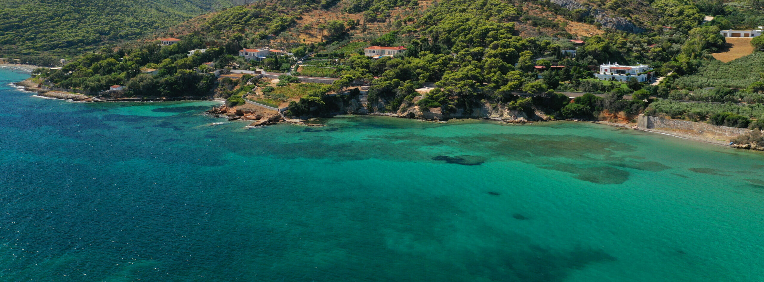 An enchanting beach and island to swim off in Attica